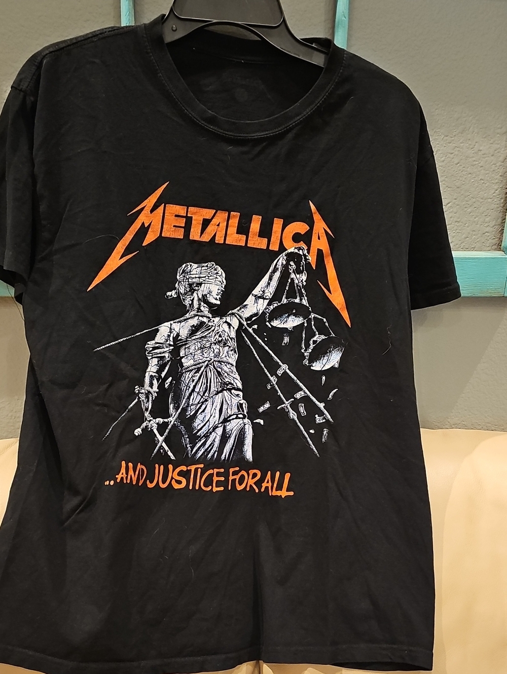 Metallica Men’s Black Short-Sleeve Graphic Tee with Orange Logo